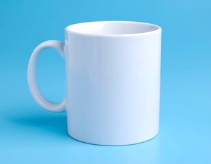 Obraz premium Blank white mug on a blue background