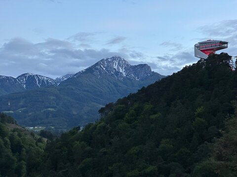 Mountain landscape with modern Bergisel Ski Jump architecture, Innsbruck, Tyrol, Austria, May 2024