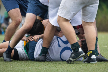 Rugby players forming a ruck during a match