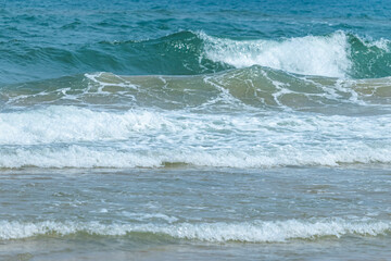 The blue sea on the beach