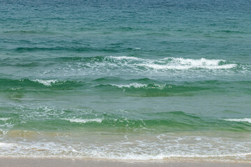 The blue sea on the beach