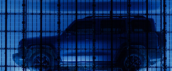 Futuristic car in blue squares behind bars
