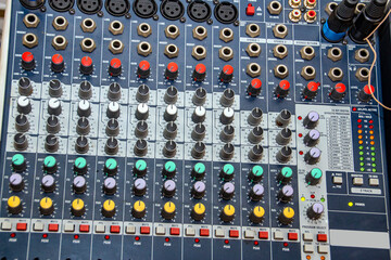 Buttons and switches on the audio mixer panel