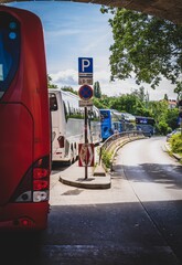 Vienna, Austria - 05 20 2024:  A line of tourist coaches waiting for their passengers to arrive.