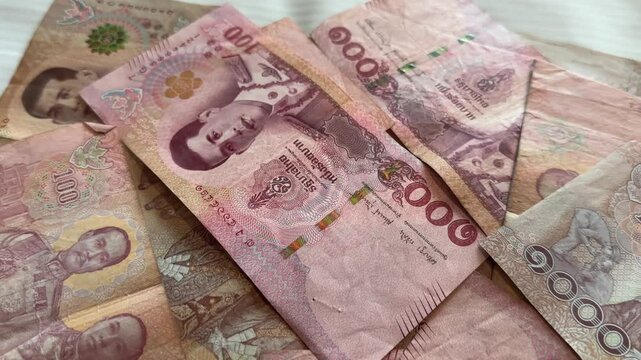 Thailand thai baht money cash currency notes and bills ฿ THB