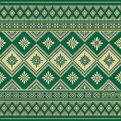 Obraz premium Green and Cream Thai Tribal Fabric Seamless Pattern