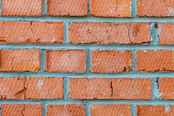 A brick wall in the macro style in orange and gray tones