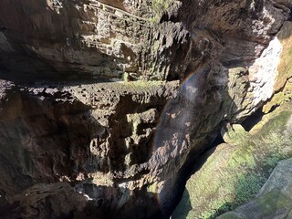 inside the cave with rainbow