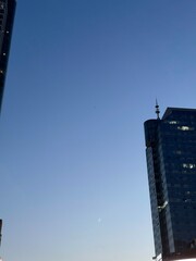 high rise building against blue sky