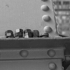 Nuts and bolds in an abstract black and white image