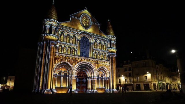 Exterior of Notre Dame la Grande church at night, in Poitiers. France