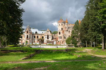 Fototapeta premium The ruins of an abandoned castle in the estate of Vladimir Khrapovitsky. Muromtsevo. architectural monument of the 19th century Neo-Gothic. Vladimir region, Russia
