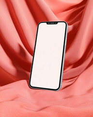 A sleek, modern smartphone resting elegantly against the soft, luxurious folds of coral fabric, its screen a blank canvas, inviting endless possibilities. 