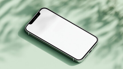 Sleek smartphone rests on a soft green surface, casting subtle shadows that add depth and elegance. It's a visual narrative of minimalism and modernity.