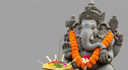 Statue of Lord Ganesha with Flower Garland and Offering Hindu God, Religious Sculpture, Indian Culture.