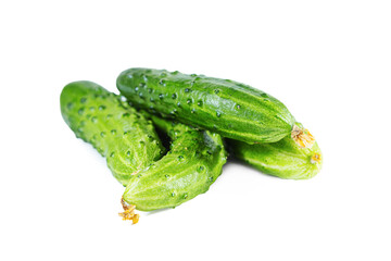 Green fresh cucumbers isolated on white background. Healthy eating.