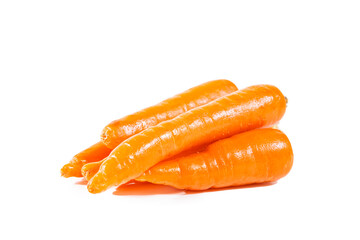 Ripe juicy carrot isolated on white background.