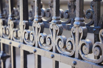 Antique wrought iron grating. Painted with black paint, close-up