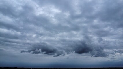 Obraz premium Brooding Sky Over the Horizon