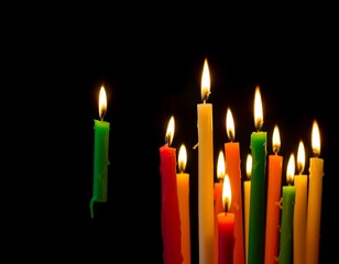 Candles burning in the dark