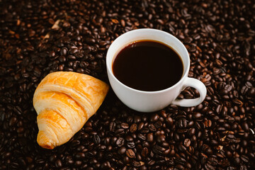 Close-up of roasted brown coffee beans falling against white background, showcasing texture, aroma, freshness, and energy for a morning brew.