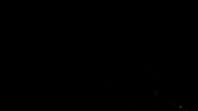 Falling colorful light energy streak motion graphics with plain black background