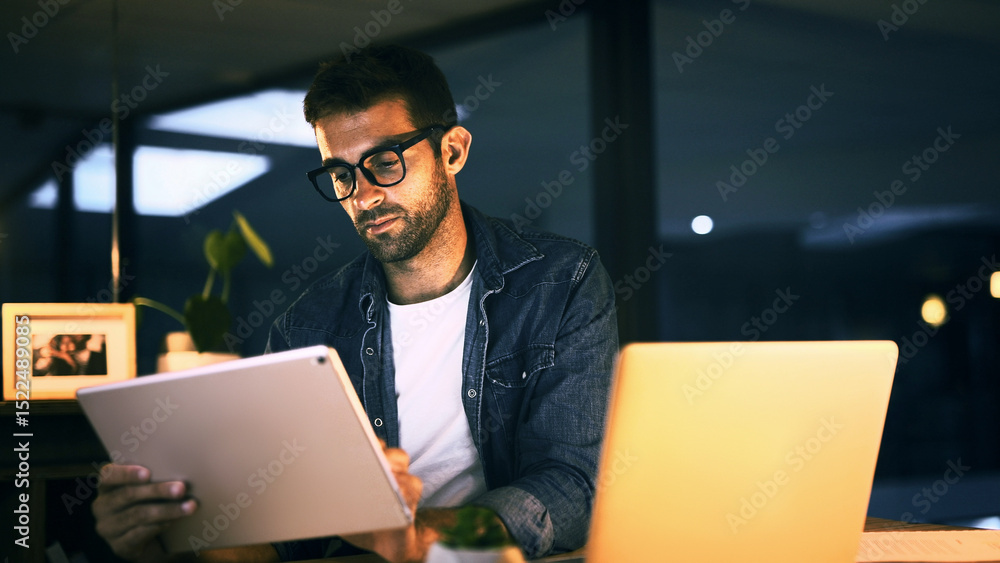 Poster tablet, laptop and man in office at night with creative project with publishing online. glasses, dig