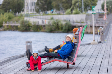 Family with children and pet dog, visiting nortern cities in Sweden, Lulea