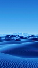 A monochrome blue landscape featuring sand dunes and distant mountains under a clear sky view scene