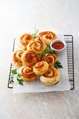 Puff pastry swirls with ham and cheese
