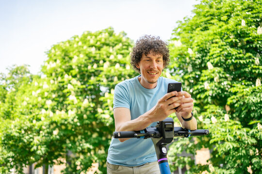 Man using e-scooter for convenient city transport