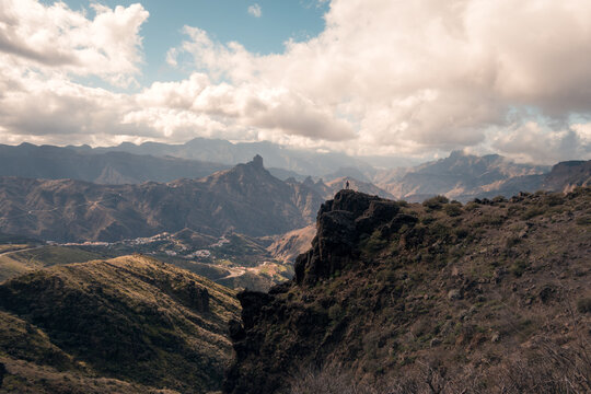 Man in cloudy day over Cruz de Tejeda in Gran Canaria