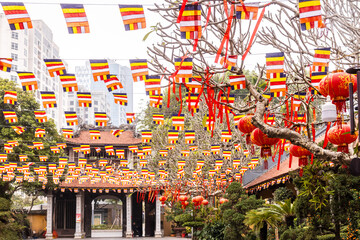 Colorful decorations in Vietnamese temple courtyard