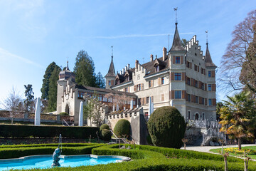 A picturesque view of Seeburg Castle in Kreuzlingen, Switzerland, standing majestically on the tranquil shores of Lake Constance