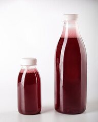 Bottles of Deep Red Beverage Fresh, Vibrant and Full of