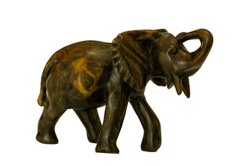 A traditional African hand-carved stone elephant souvenir isolated against a white background