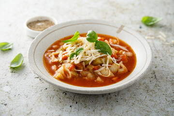 Traditional minestrone soup with cheese