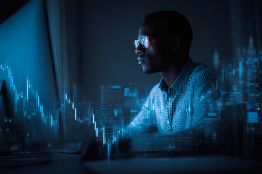 A man using laptop computer analyzing data and stock market