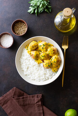 Meatballs in curry sauce with rice. Healthy food. Recipe.