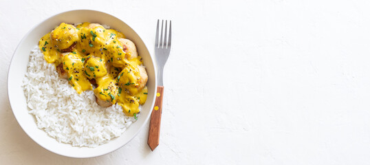 Meatballs in curry sauce with rice. Healthy food. Recipe.