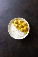 Meatballs in curry sauce with rice. Healthy food. Recipe.