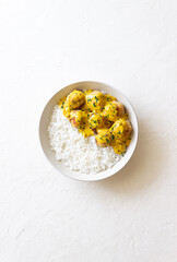 Meatballs in curry sauce with rice. Healthy food. Recipe.