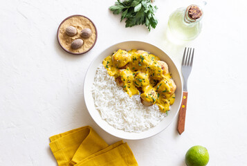 Meatballs in curry sauce with rice. Healthy food. Recipe.
