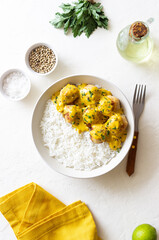 Meatballs in curry sauce with rice. Healthy food. Recipe.