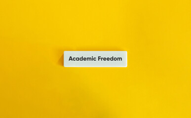 Academic Freedom Letter Tile on Yellow Background – Minimalist Education and Rights Concept