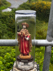 statue of Saint James under a glas tube on the pilgrimage along the road to Santiago in Portugal, Caminho Portugues