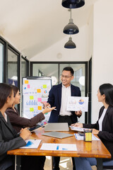Group of business people working together with dashboard analysis and data management a meeting table in office.