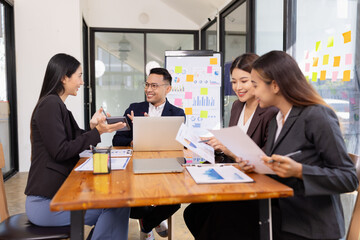 Group of business people working together with dashboard analysis and data management a meeting table in office.