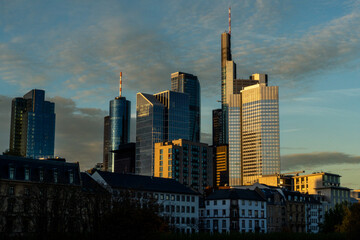 Urban cityscape at sunset with modern architecture and skyline

