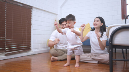 Before putting the kids to bed, parents, and kid unwind and play
